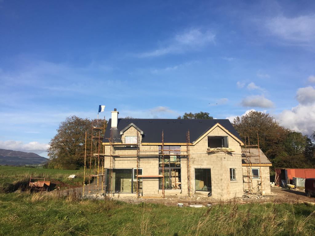 Brick work up to roof level