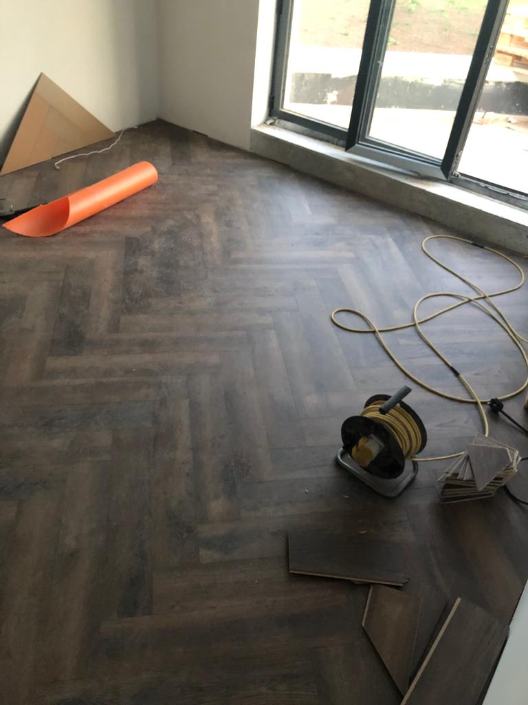 Semi solid wood flooring allowing expansion for underfloor heating